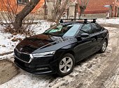 Багажник Thule WingBar Evo Black на аэродинамических дугах для Skoda Octavia (2021-н.в.)