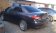 Багажник LUX на прямоугольных дугах для  Toyota Corolla седан (2007-2013)