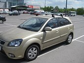 Багажник LUX на аэродинамических дугах для  Kia Rio 5-дв хетчбэк (2005-2011)