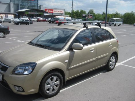 Багажник LUX на аэродинамических дугах для  Kia Rio 5-дв хетчбэк (2005-2011)
