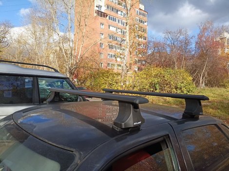 Багажник Атлант на черных крыловидных дугах для Lada 2110