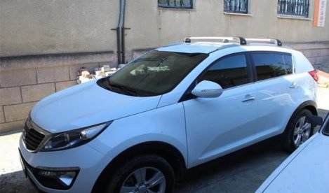 Багажник Thule WingBar Edge на интегрированных дугах для Kia Sportage (2010-2015)
