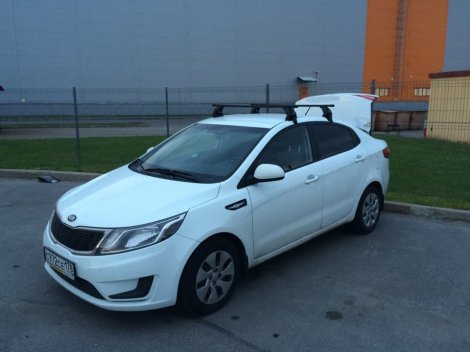 Багажник LUX на прямоугольных дугах для  Kia Rio седан (2011-2017)