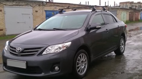 Багажник LUX на прямоугольных дугах для  Toyota Corolla седан (2007-2013)