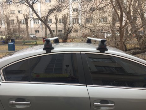 Багажник MontBlanc на аэродинамических дугах для Toyota Avensis седан (2009-2018)