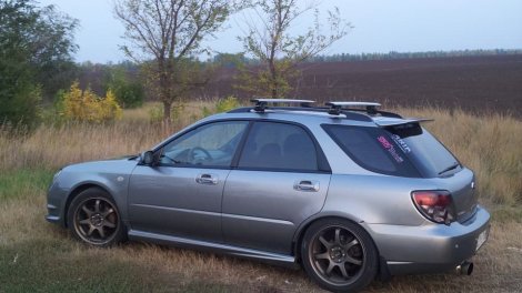 Багажник Thule WingBar на аэродинамических дугах для Subaru Impreza универсал (2000-2007)