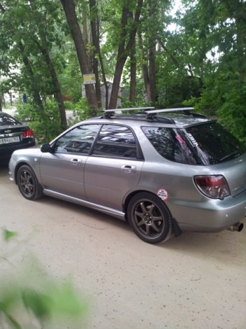Багажник Thule WingBar на аэродинамических дугах для Subaru Impreza универсал (2000-2007)