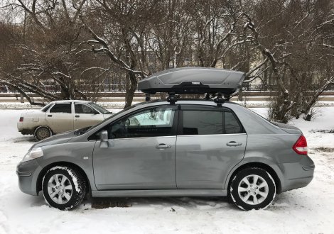 Багажник Thule WingBar на аэродинамических дугах для Nissan Tiida седан (2004-2015)