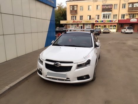 Багажник Thule WingBar на аэродинамических дугах для Chevrolet Cruze седан (2009-2015)