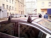 Оригинальный багажник на аэродинамических дугах для Renault Fluence