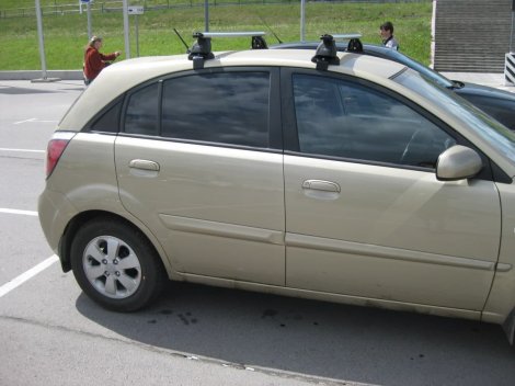 Багажник LUX на аэродинамических дугах для  Kia Rio 5-дв хетчбэк (2005-2011)