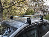 Багажник MontBlanc на аэродинамических дугах для Nissan Tiida седан (2004-2015)