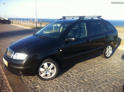 Багажник Thule SquareBar Evo на стальных дугах для Skoda Fabia универсал (2000-2007)