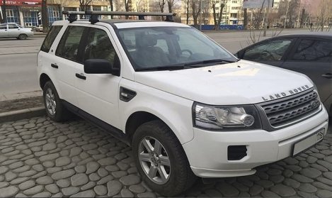 Багажник Thule SlideBar на выдвижных дугах для Land Rover Freelander II
