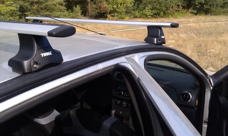Багажник Thule WingBar на аэродинамических дугах для Renault Logan