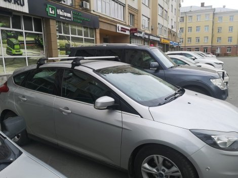 Багажник LUX CITY серебристый на аэродинамических дугах для Ford Focus 5-дв (2011-2018)