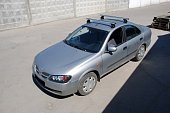 Багажник LUX на аэродинамических дугах для Nissan Almera седан (2000-2006)