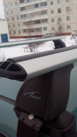 Багажник LUX на аэродинамических дугах для  Kia Rio седан (2011-2017)