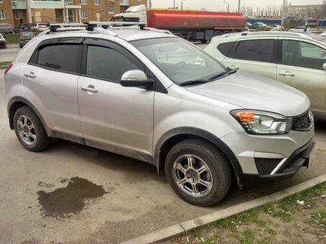 Багажник Thule WingBar на аэродинамических дугах для SsangYong Actyon