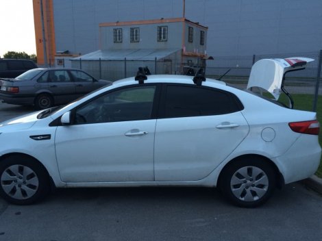 Багажник LUX на прямоугольных дугах для  Kia Rio седан (2011-2017)